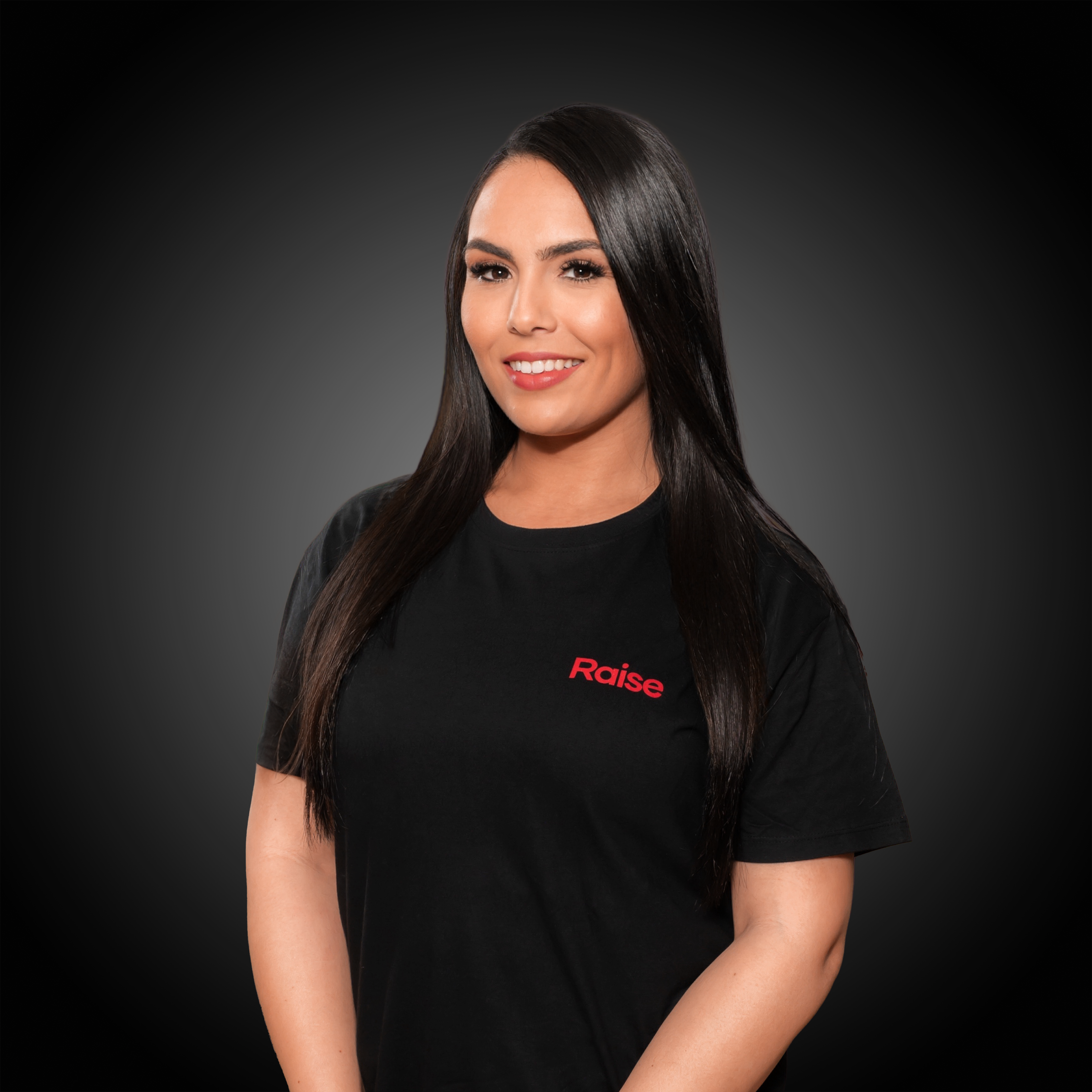 Célia wearing the black Raise Tshirt