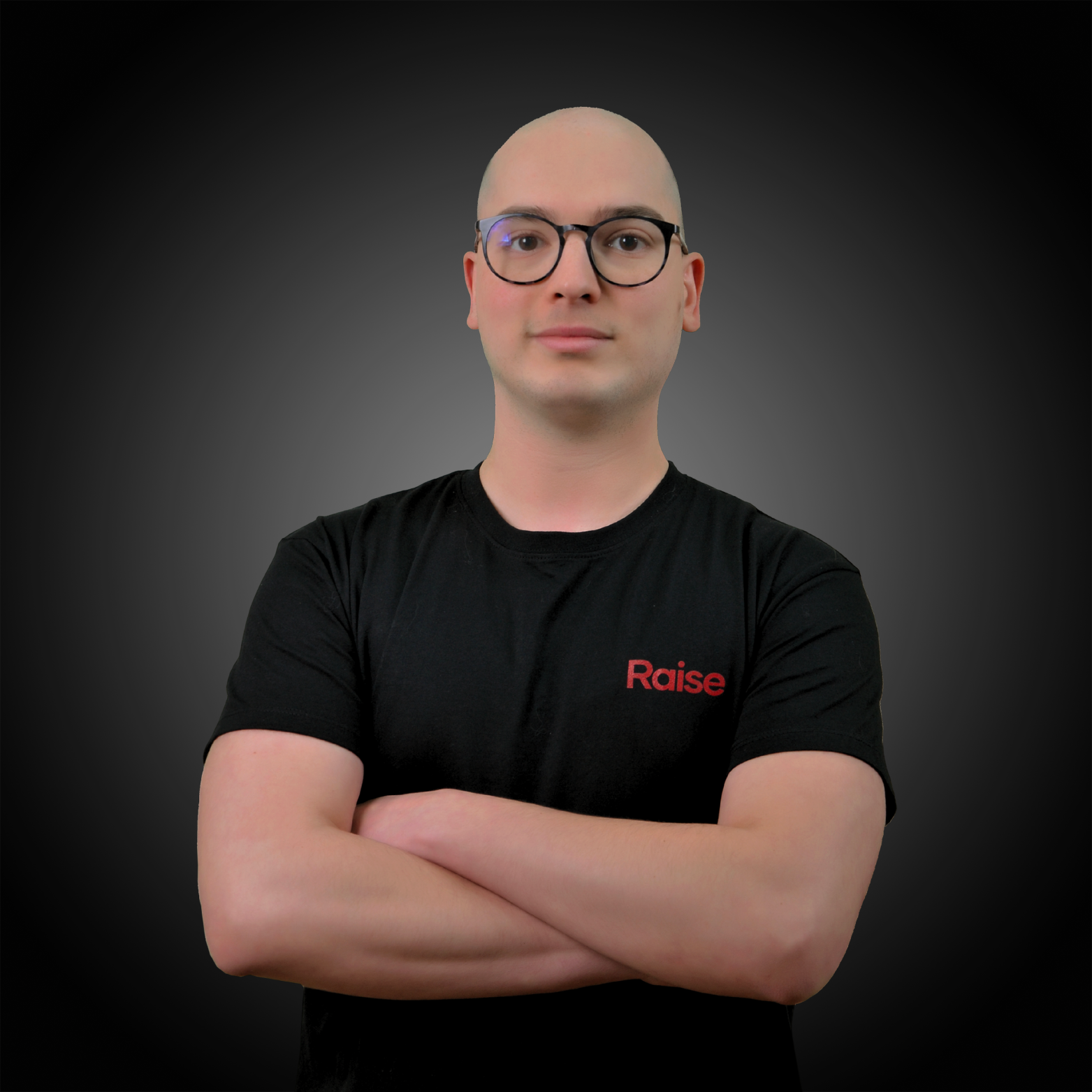 Nabil wearing the black Raise Tshirt