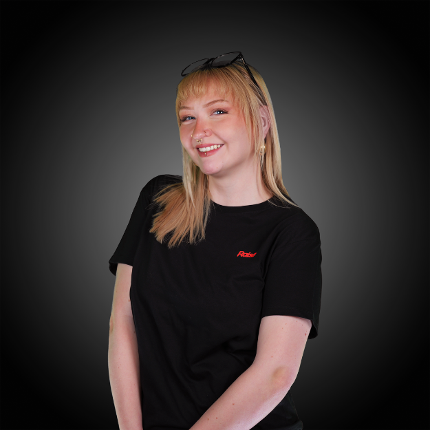 Orlane wearing the black Raise Tshirt